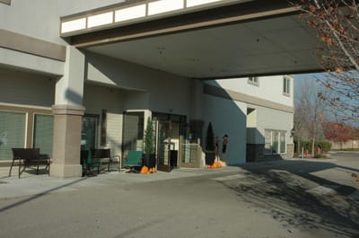 Entrance of Edgewood Spring Creek Eagle Island with seasonal decor