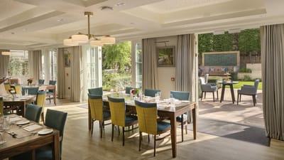Bright dining room with indoor-outdoor access