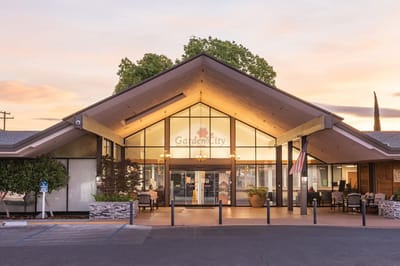 Front entrance of Garden City Healthcare Center at sunset