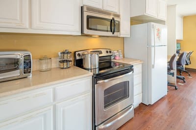 Kitchen area with appliances and workspace