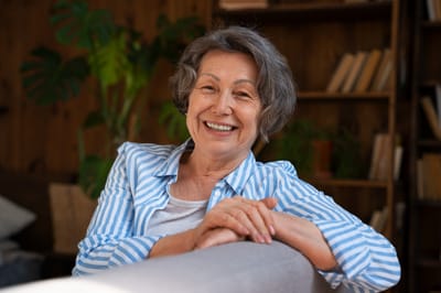 Smiling senior woman in a common area