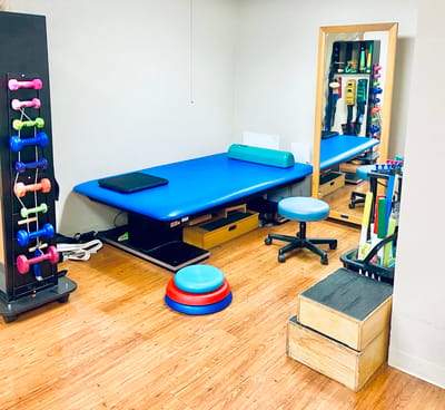 Interior view of a therapy room with equipment