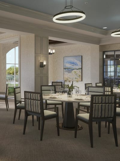 Elegant dining area with stylish tables and decor