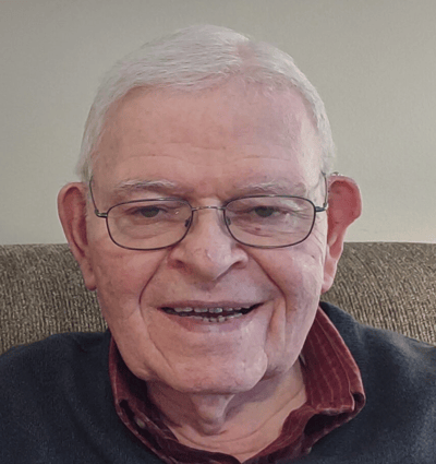 Elderly man smiling at the camera