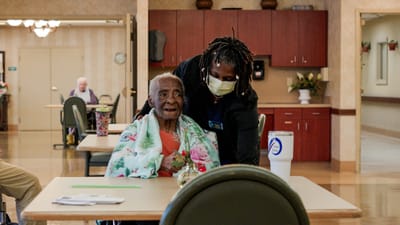 Timberlane Health & Rehab, assisted living in El Dorado, AR — Resident and staff member interacting in a care facility
