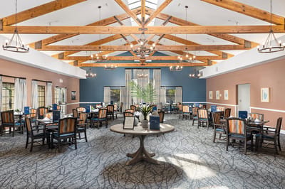 Dining area with communal tables and modern decor