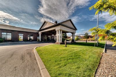 Exterior view of Life Care Center of Casper with landscaped entrance