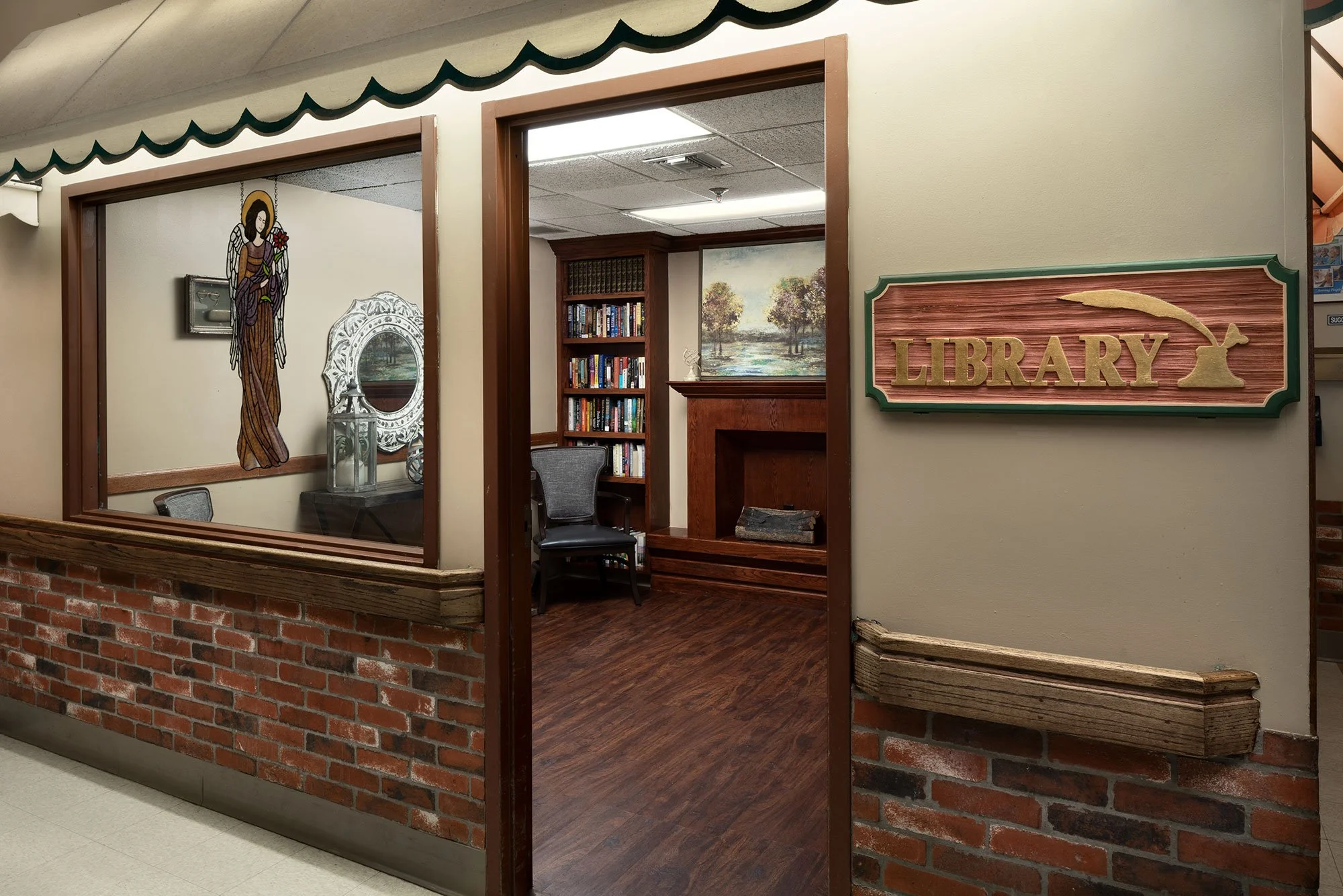 Interior view of a library with wooden signage