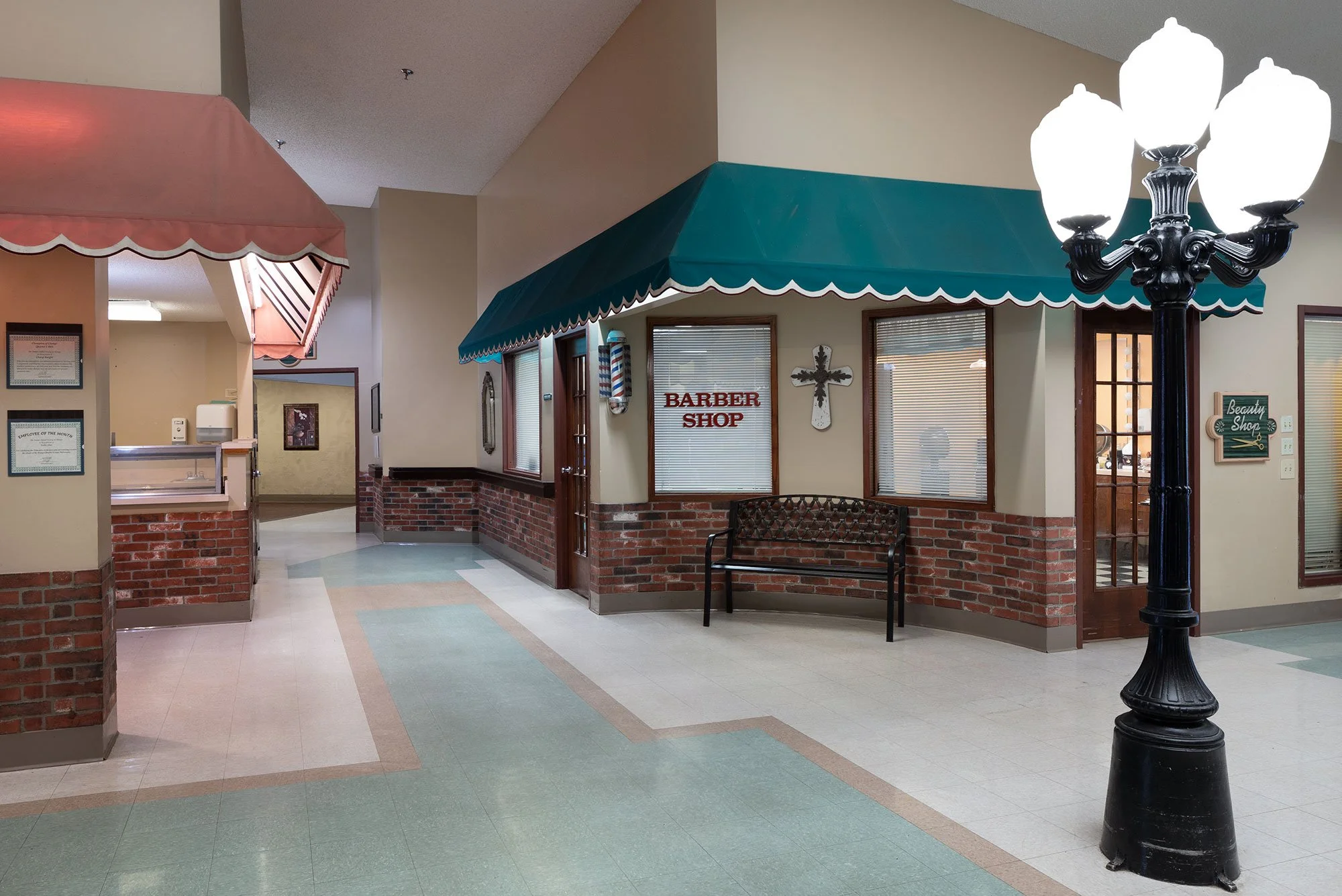 Interior view of a barber shop area in the facility
