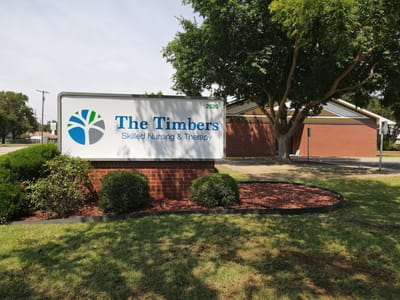 Exterior sign of The Timbers Skilled Nursing & Therapy facility