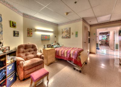 Cozy resident room with chair and decorations