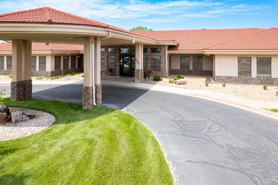 Front entrance of Retirement Ranch with landscaping
