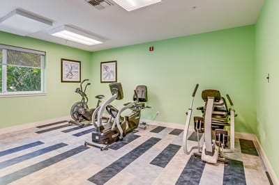 Modern fitness room with exercise equipment