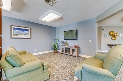 Interior common area with seating and television