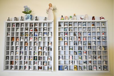 The Inn at Fairview, nursing home in Hudson, NH — Collection of decorative thimbles on display shelves