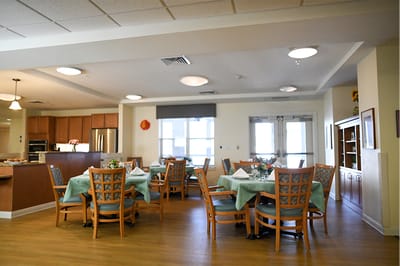 The Inn at Fairview, nursing home in Hudson, NH — Dining room with tables set for residents