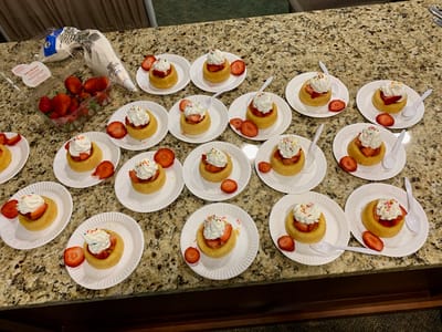 The Inn at Fairview, nursing home in Hudson, NH — Dessert plates with cupcakes and strawberries on a counter