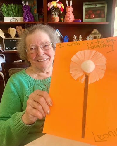 The Inn at Fairview, nursing home in Hudson, NH — Senior resident holding a homemade craft project