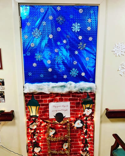 The Inn at Fairview, nursing home in Hudson, NH — Festive holiday decorations on a decorated door