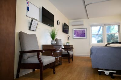 Cozy interior of a resident room with seating area