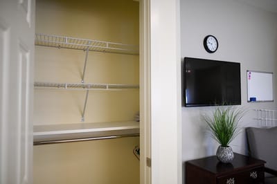 Interior view of a resident room with a television