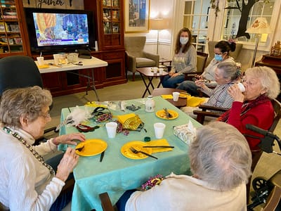 The Inn at Fairview, nursing home in Hudson, NH — Residents engaged in a craft activity at a table