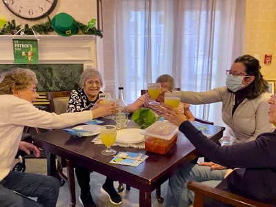 The Inn at Fairview, nursing home in Hudson, NH — Residents celebrating with drinks around a table