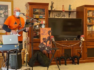 The Inn at Fairview, nursing home in Hudson, NH — Musician performing with decorations for Halloween event