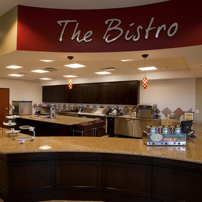 The Bistro dining area with a modern kitchen setup