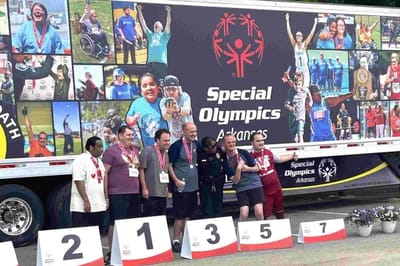 Pathfinder, Inc. Longwood ICF/IID, assisted living in Searcy, AR — Group of medalists celebrating at a Special Olympics event