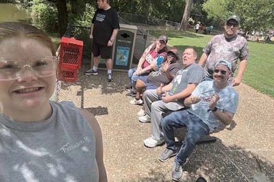 Residents enjoying time outdoors in a park setting