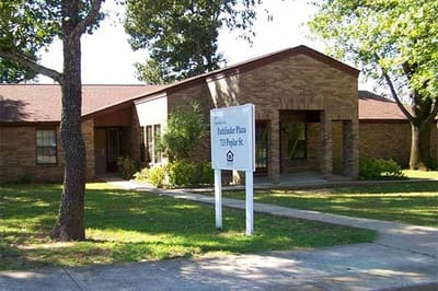 Exterior view of Pathfinder Plaza building with signage