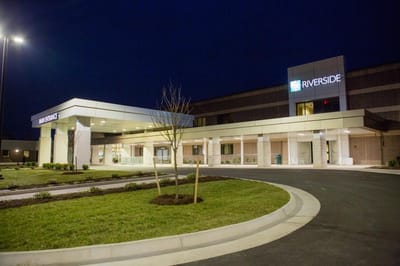 Exterior view of Warwick Forest entrance at night