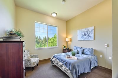 Comfortable private bedroom with natural light