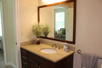 A well-decorated bathroom vanity in a resident's unit