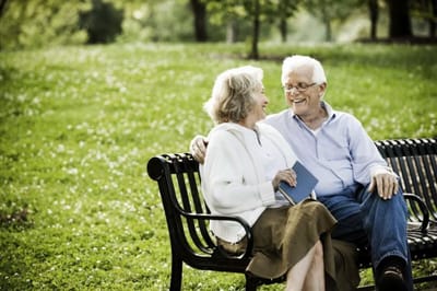 A couple enjoying each other's company in a park