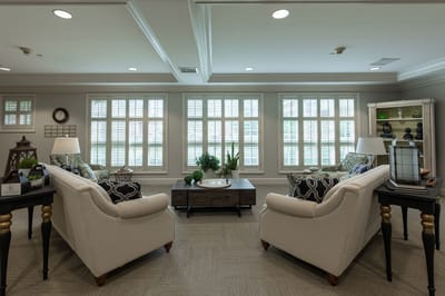 Cozy lounge area with comfortable seating and natural light