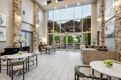Bright interior lobby with seating and large windows