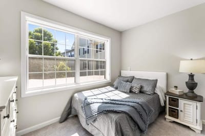 Cozy bedroom with natural light and simple decor