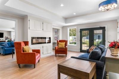 A cozy common area with comfortable seating and natural light