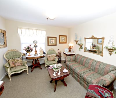 Cozy sitting area with vintage decor and seating