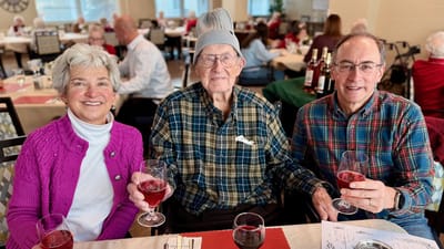 Residents enjoying drinks while celebrating together