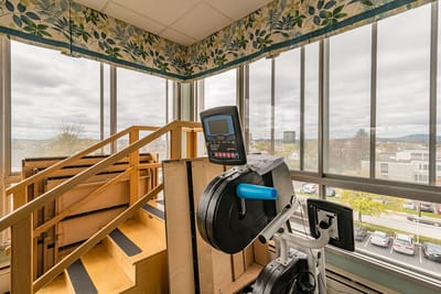 Interior view of a fitness area with exercise equipment