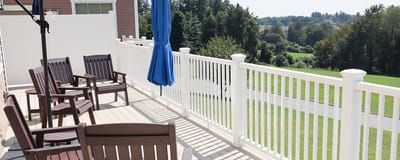 Outdoor patio area with seating and view