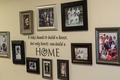 Photo collage of residents and sentimental wall art