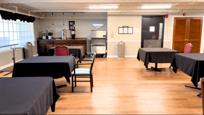 Dining area with tables and chairs set up