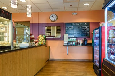 Interior of a café area with food and beverages