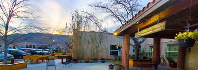 Outdoor seating area with mountain backdrop