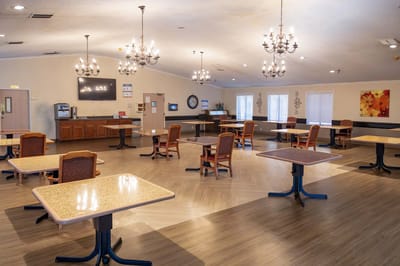 Dining room area with tables and chairs