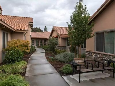 Pathway through landscaped gardens at the facility